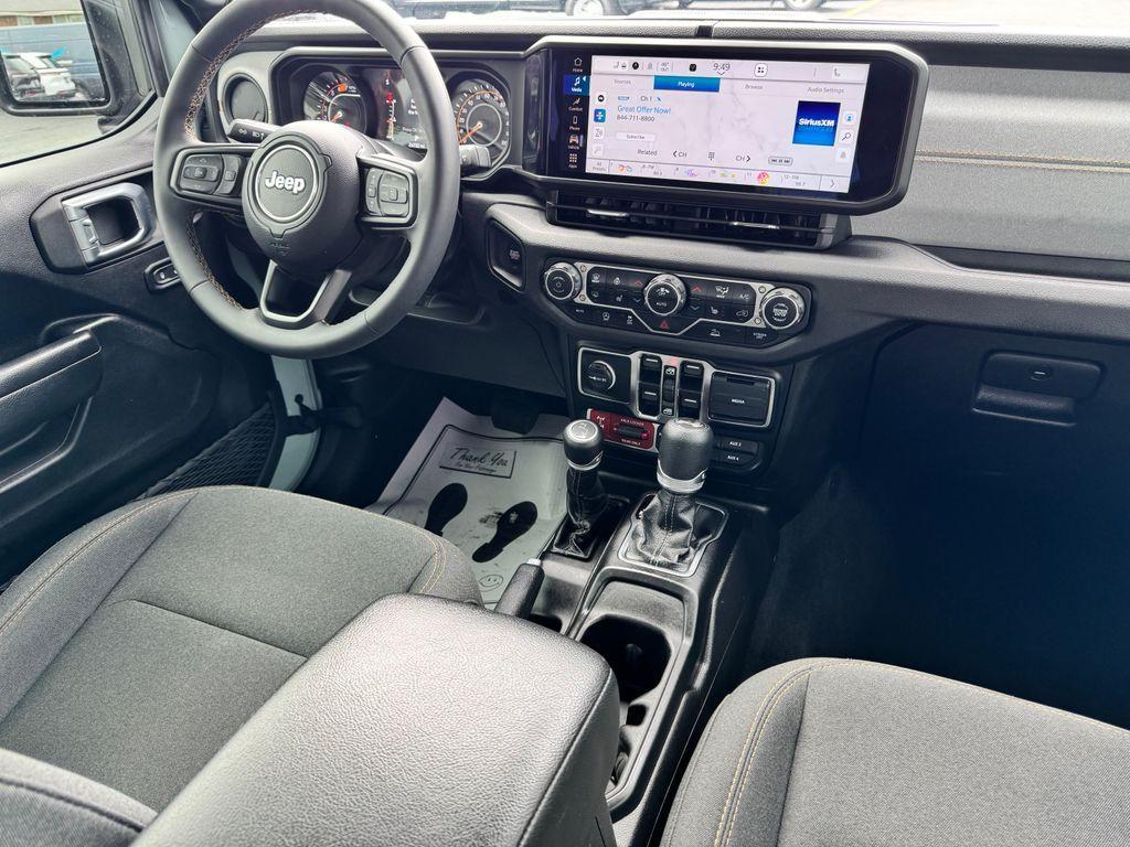 used 2024 Jeep Wrangler car, priced at $38,196