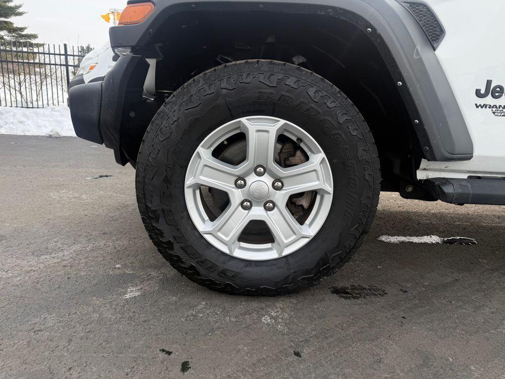 used 2021 Jeep Wrangler Unlimited car, priced at $27,022