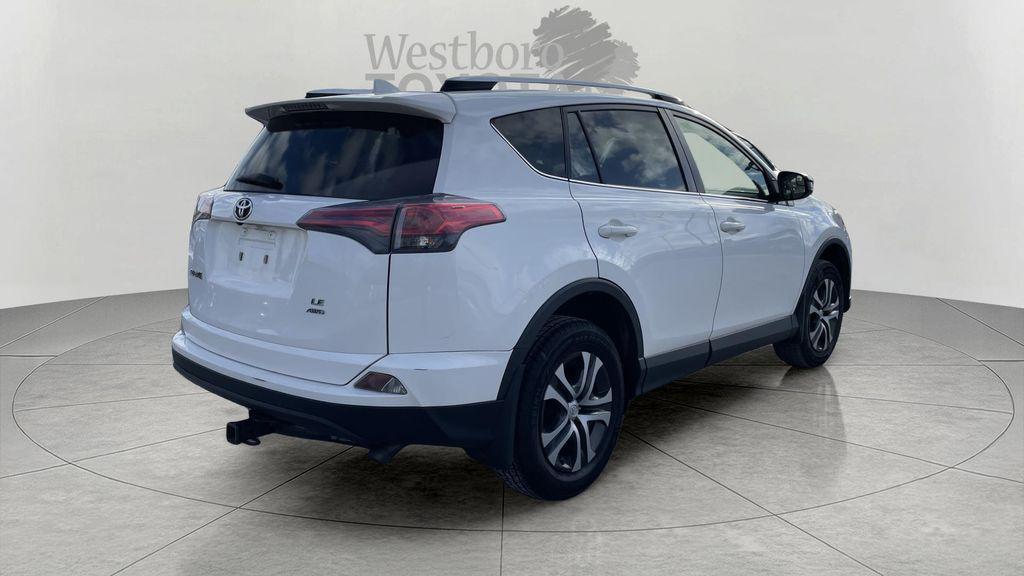 used 2016 Toyota RAV4 car, priced at $10,000