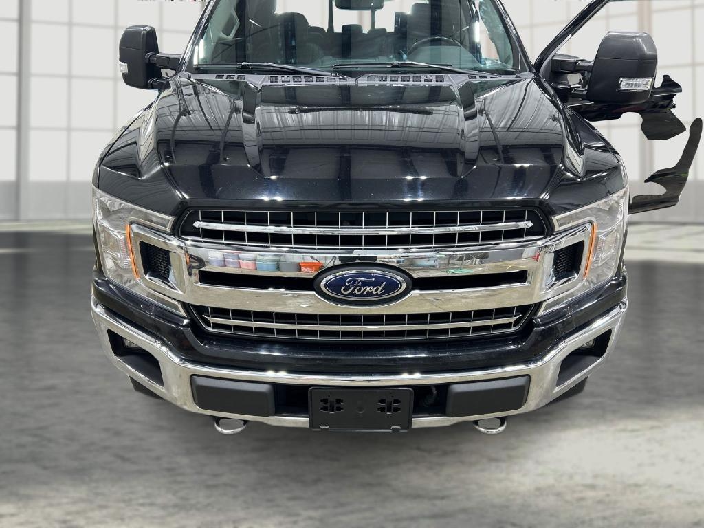 used 2018 Ford F-150 car, priced at $18,000