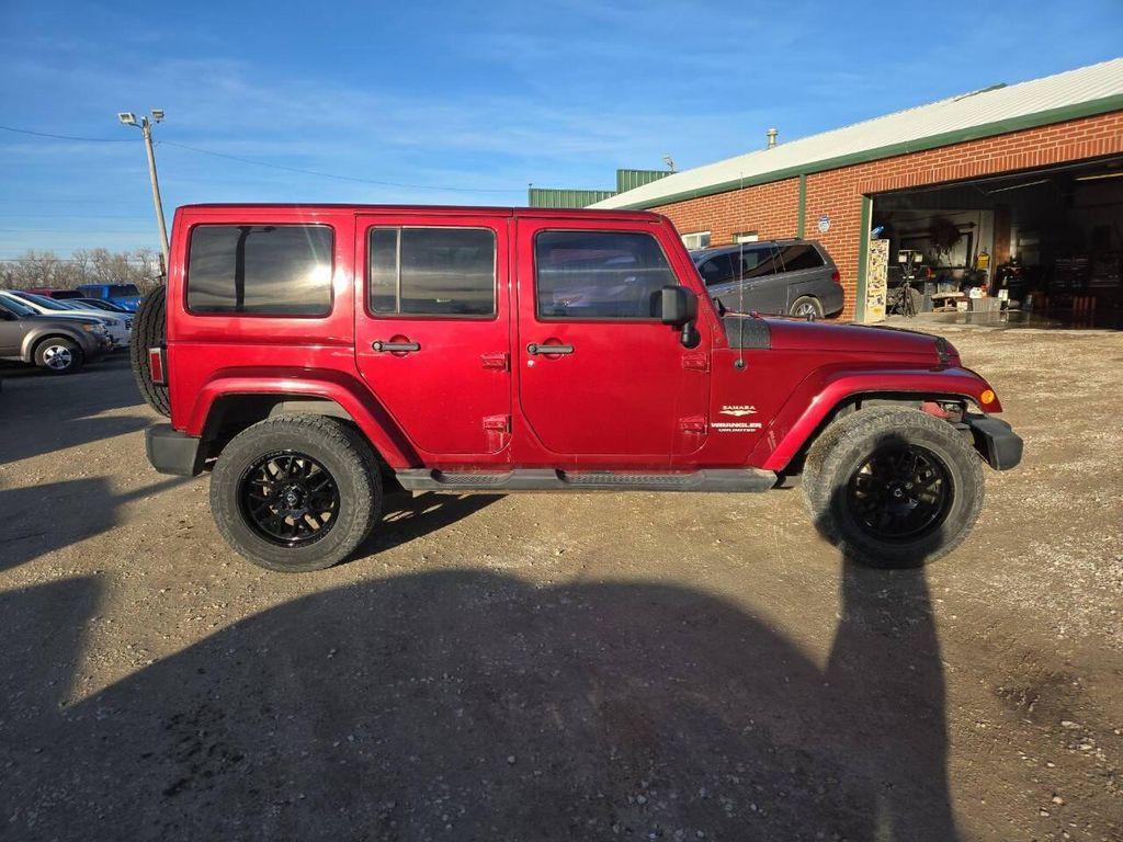 used 2013 Jeep Wrangler Unlimited car, priced at $12,495