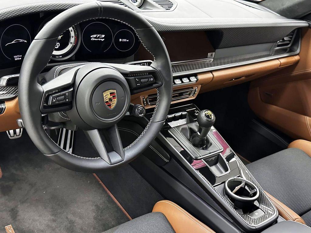 used 2024 Porsche 911 car, priced at $290,173