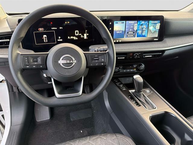 2026 Aspen White Tri Nissan Kicks