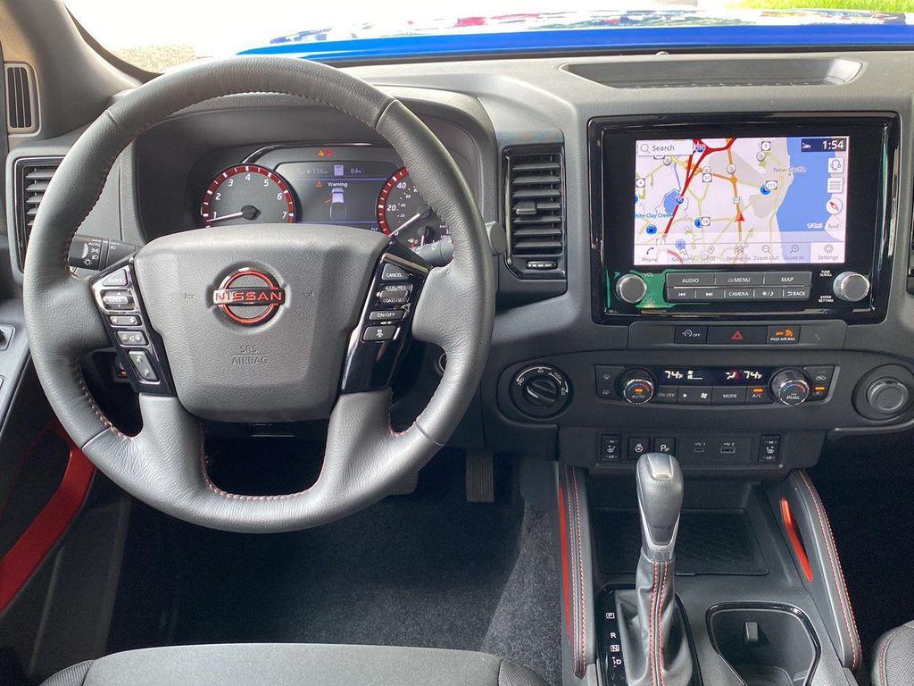 used 2024 Nissan Frontier car, priced at $37,599