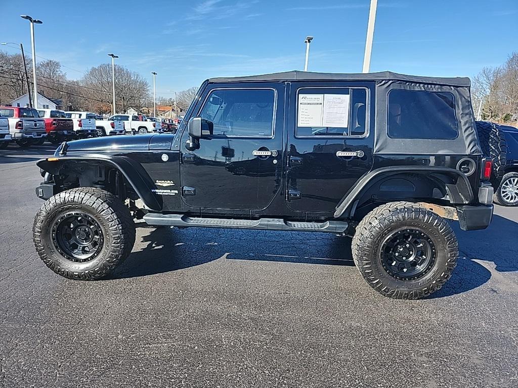 used 2015 Jeep Wrangler Unlimited car, priced at $17,271