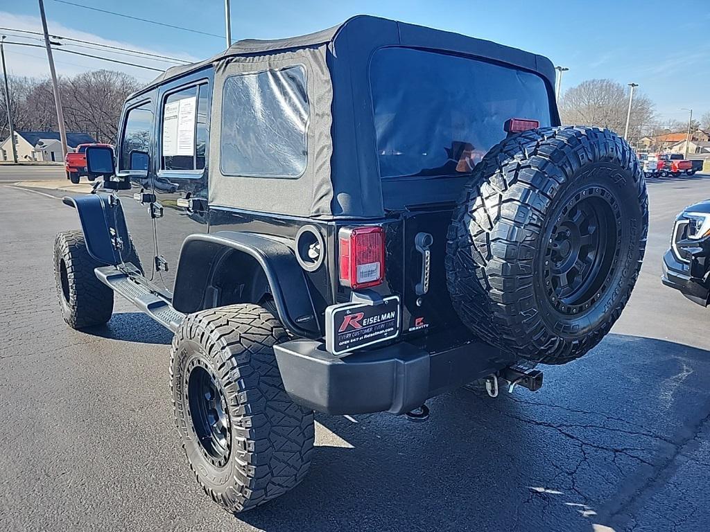 used 2015 Jeep Wrangler Unlimited car, priced at $17,271