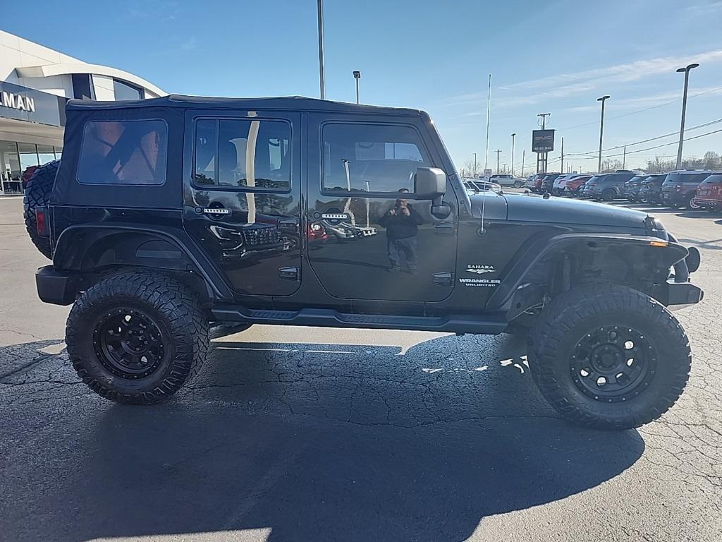 used 2015 Jeep Wrangler Unlimited car, priced at $17,271