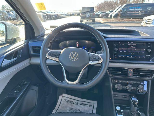 used 2024 Volkswagen Taos car, priced at $20,990