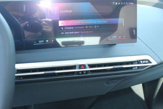 new 2026 BMW iX car, priced at $89,950