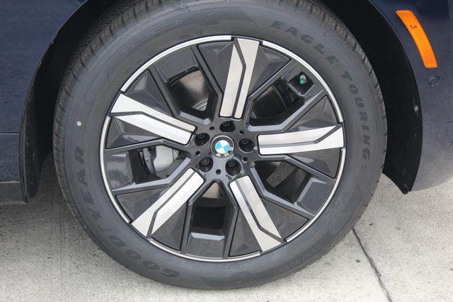 new 2026 BMW iX car, priced at $98,175