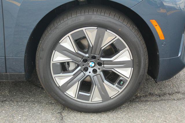 new 2026 BMW iX car, priced at $80,575