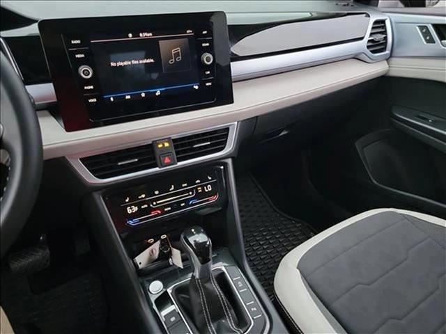 used 2025 Volkswagen Taos car, priced at $24,999