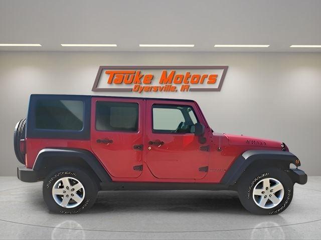used 2014 Jeep Wrangler Unlimited car, priced at $14,000