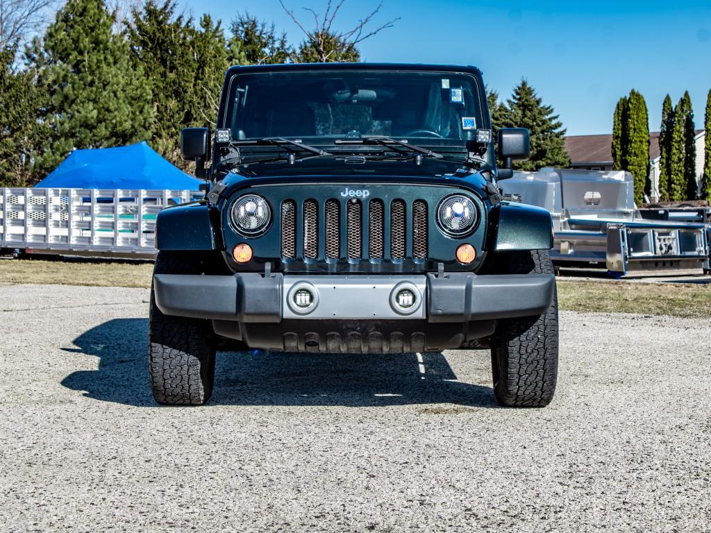 used 2012 Jeep Wrangler Unlimited car, priced at $12,995