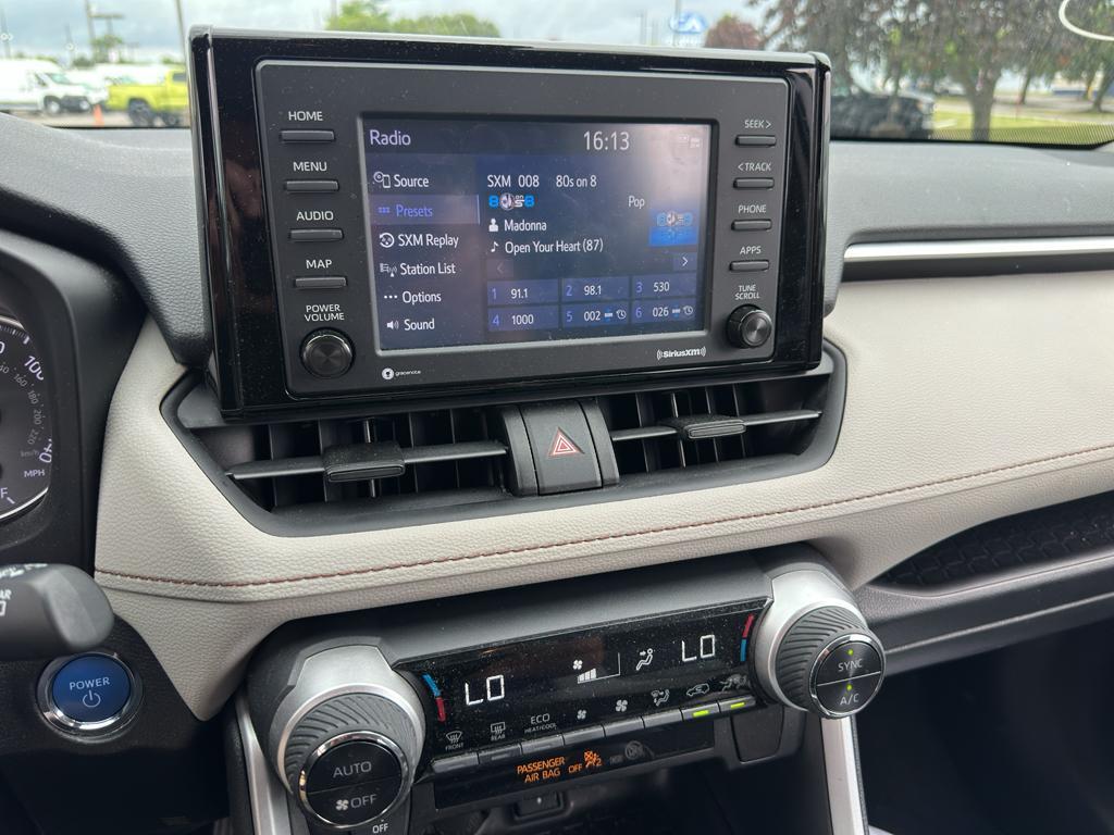 used 2021 Toyota RAV4 Hybrid car, priced at $24,476