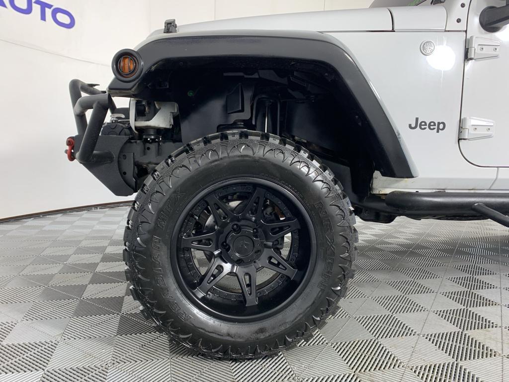 used 2014 Jeep Wrangler Unlimited car, priced at $13,990