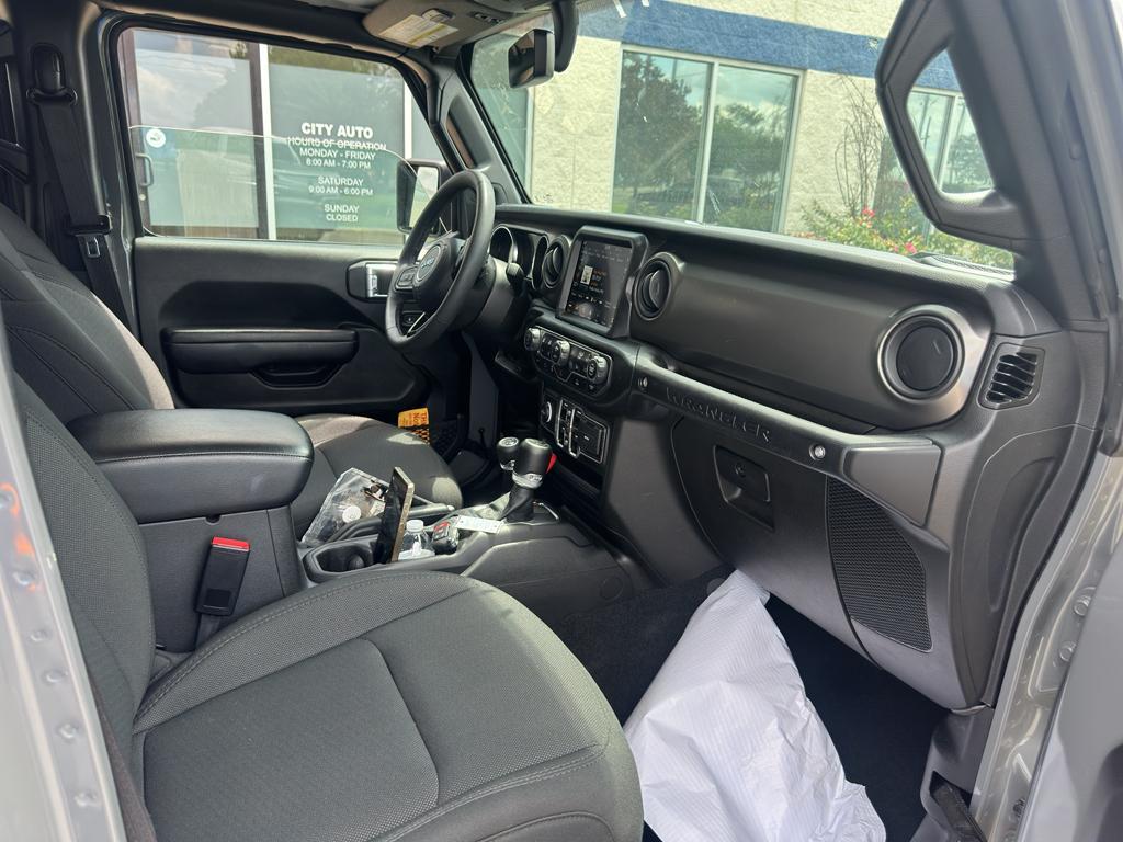 used 2023 Jeep Wrangler 4xe car, priced at $29,844