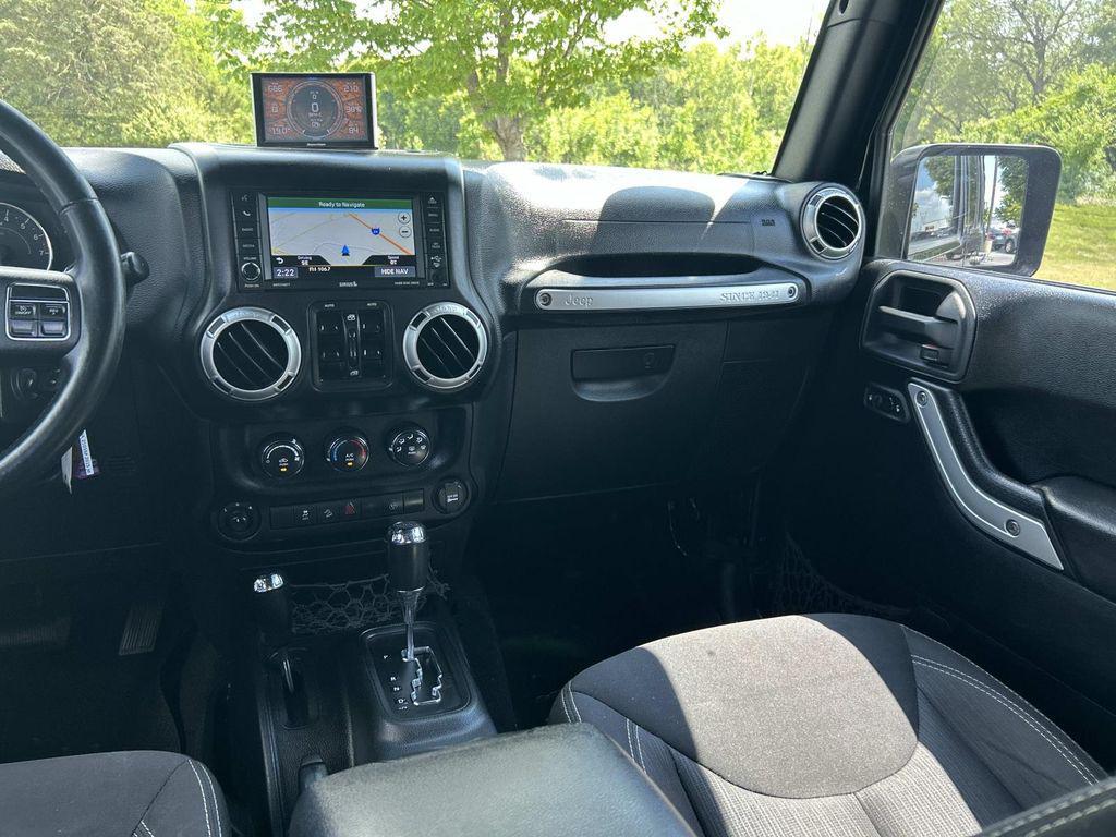 used 2015 Jeep Wrangler Unlimited car, priced at $16,980