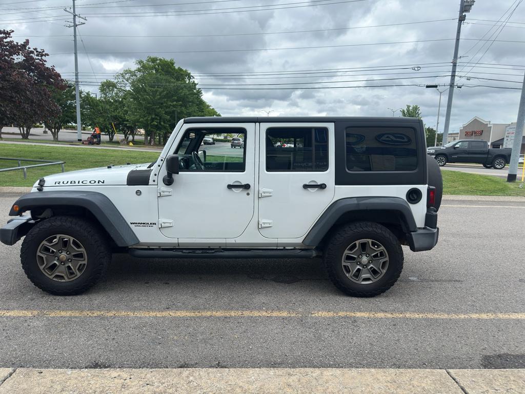 used 2017 Jeep Wrangler Unlimited car, priced at $22,843