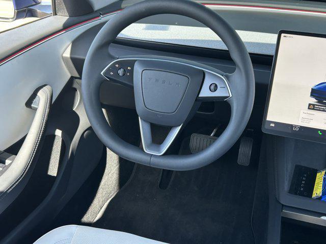 used 2025 Tesla Model 3 car, priced at $40,394