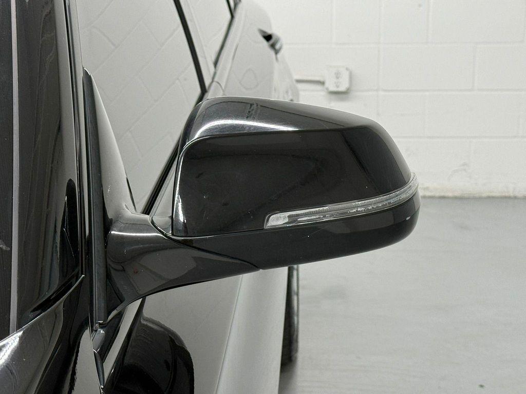 used 2013 BMW 750 car, priced at $23,795