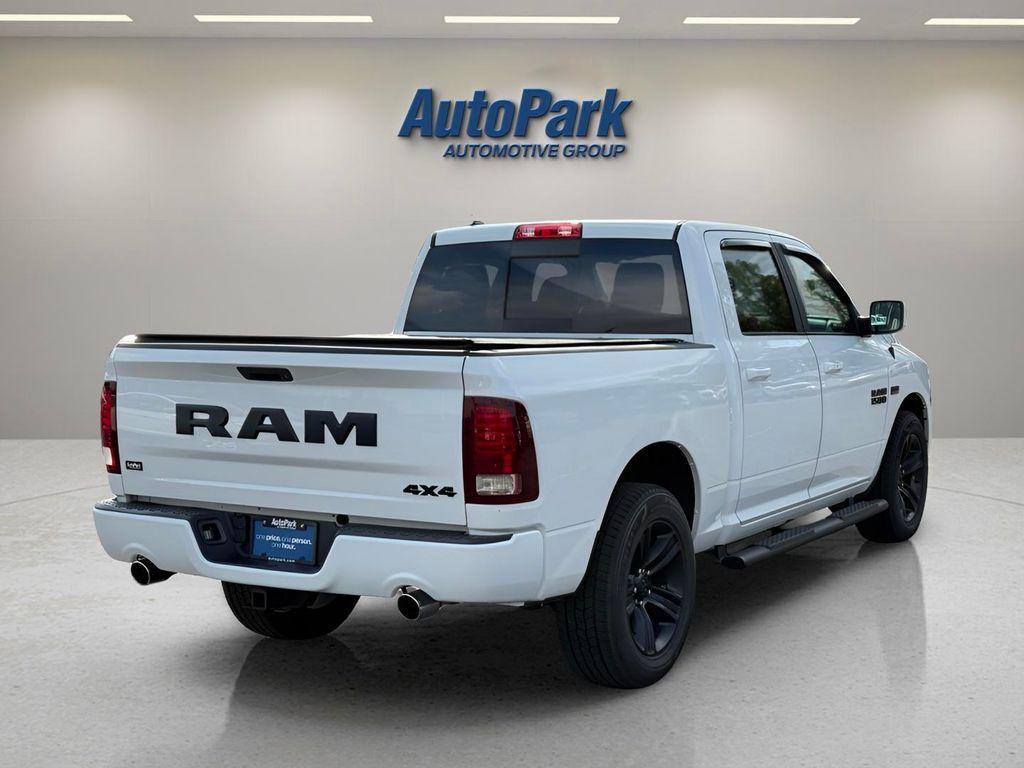 used 2018 Ram 1500 car, priced at $26,354