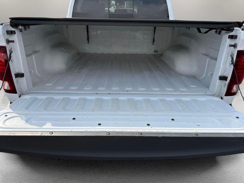 used 2018 Ram 1500 car, priced at $26,354