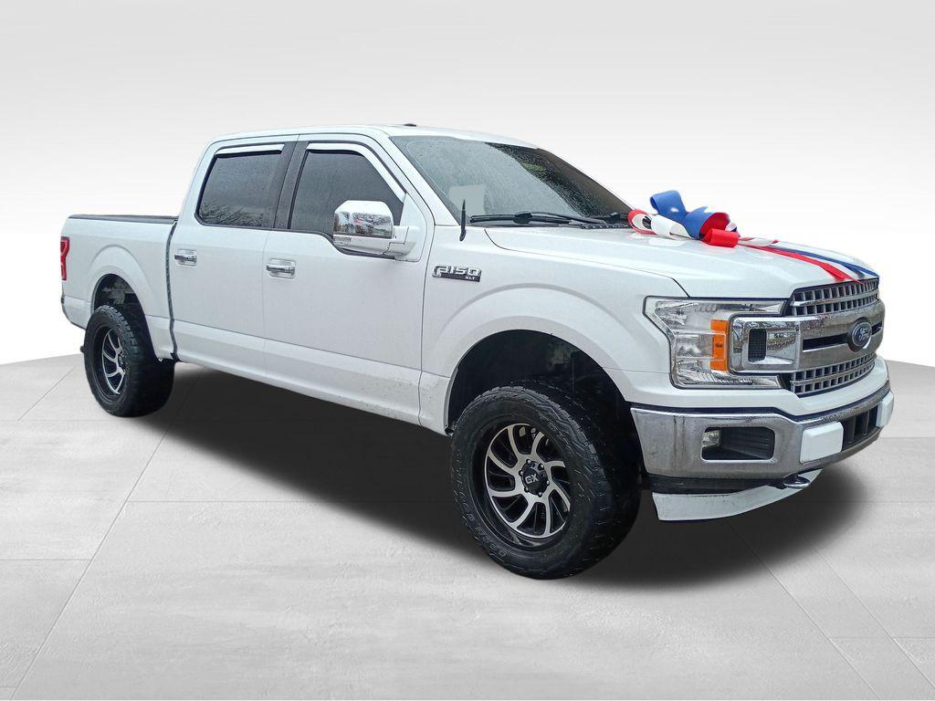 used 2018 Ford F-150 car, priced at $14,999