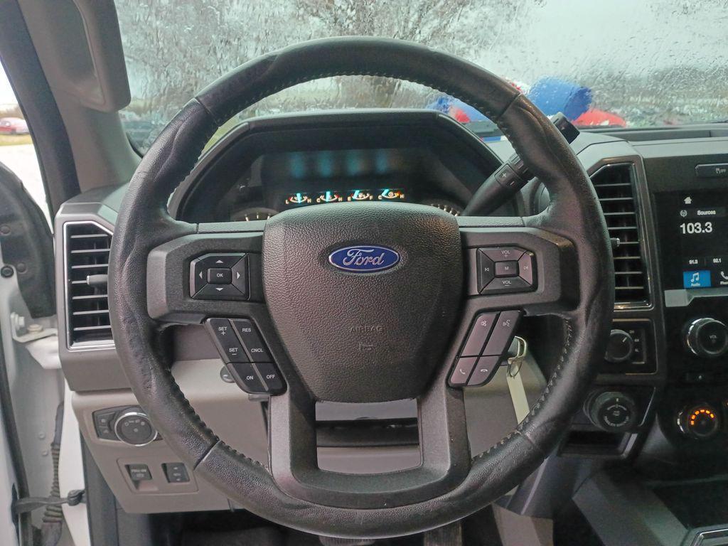 used 2018 Ford F-150 car, priced at $14,999