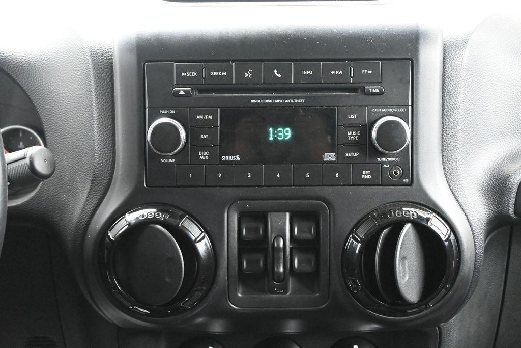 used 2012 Jeep Wrangler Unlimited car, priced at $10,798