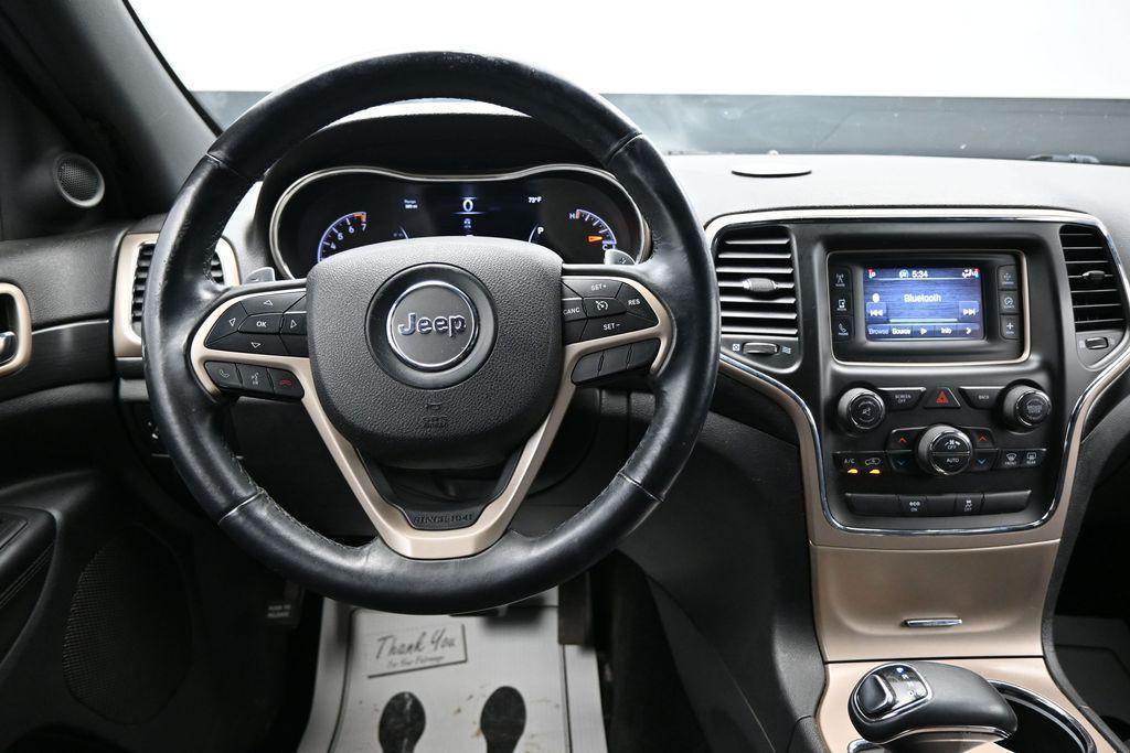 used 2014 Jeep Grand Cherokee car, priced at $9,798