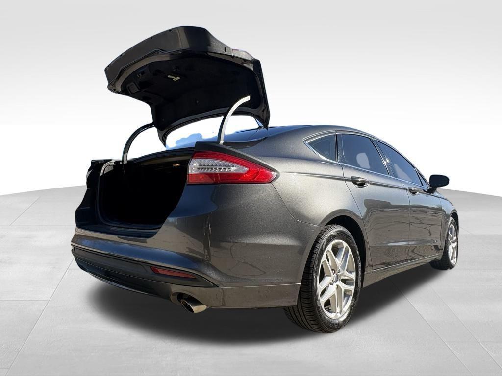 used 2016 Ford Fusion car, priced at $6,999