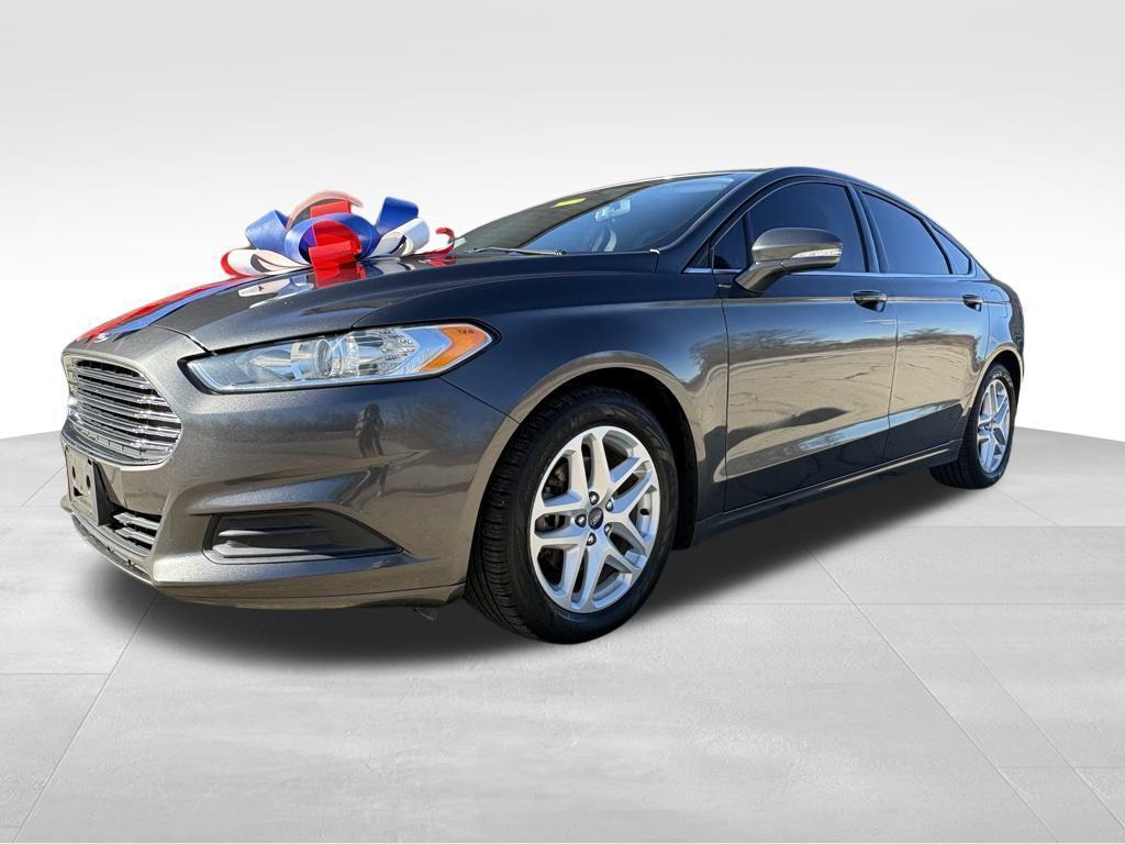 used 2016 Ford Fusion car, priced at $6,999