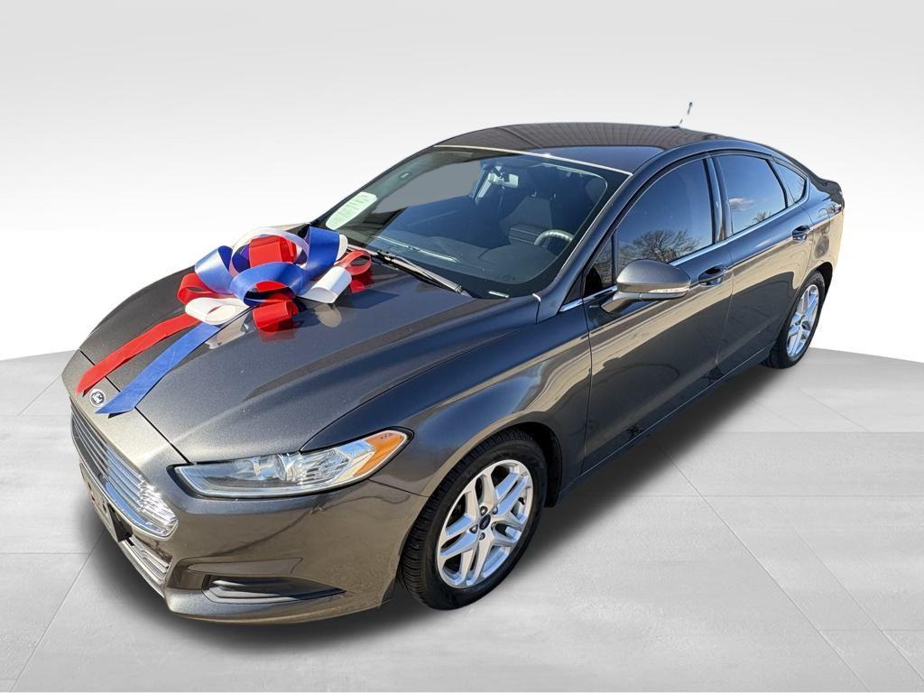 used 2016 Ford Fusion car, priced at $6,999