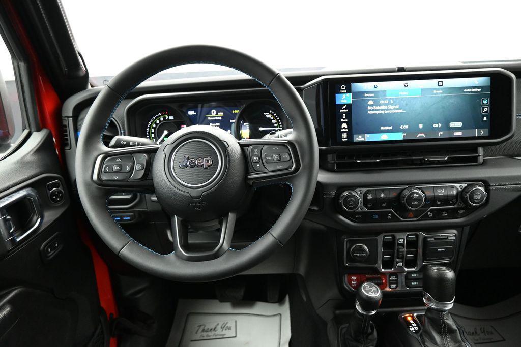 used 2025 Jeep Wrangler 4xe car, priced at $32,898