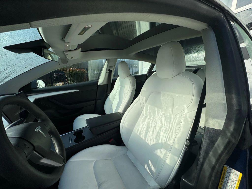 used 2023 Tesla Model 3 car, priced at $27,950
