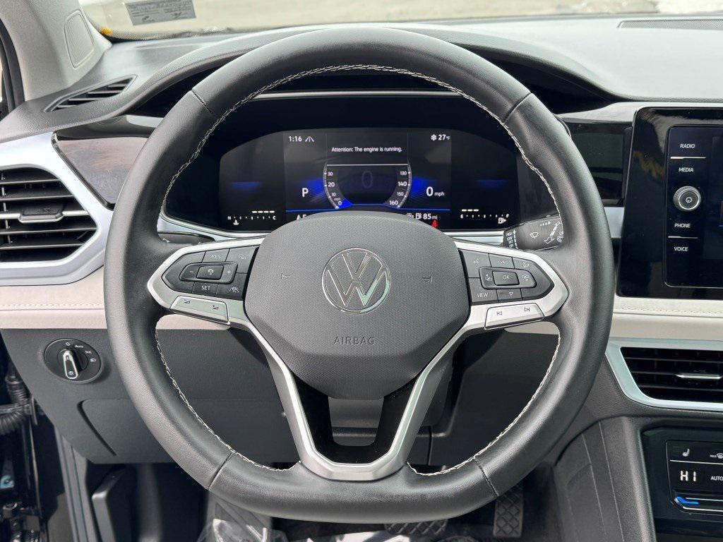 used 2025 Volkswagen Taos car, priced at $23,399