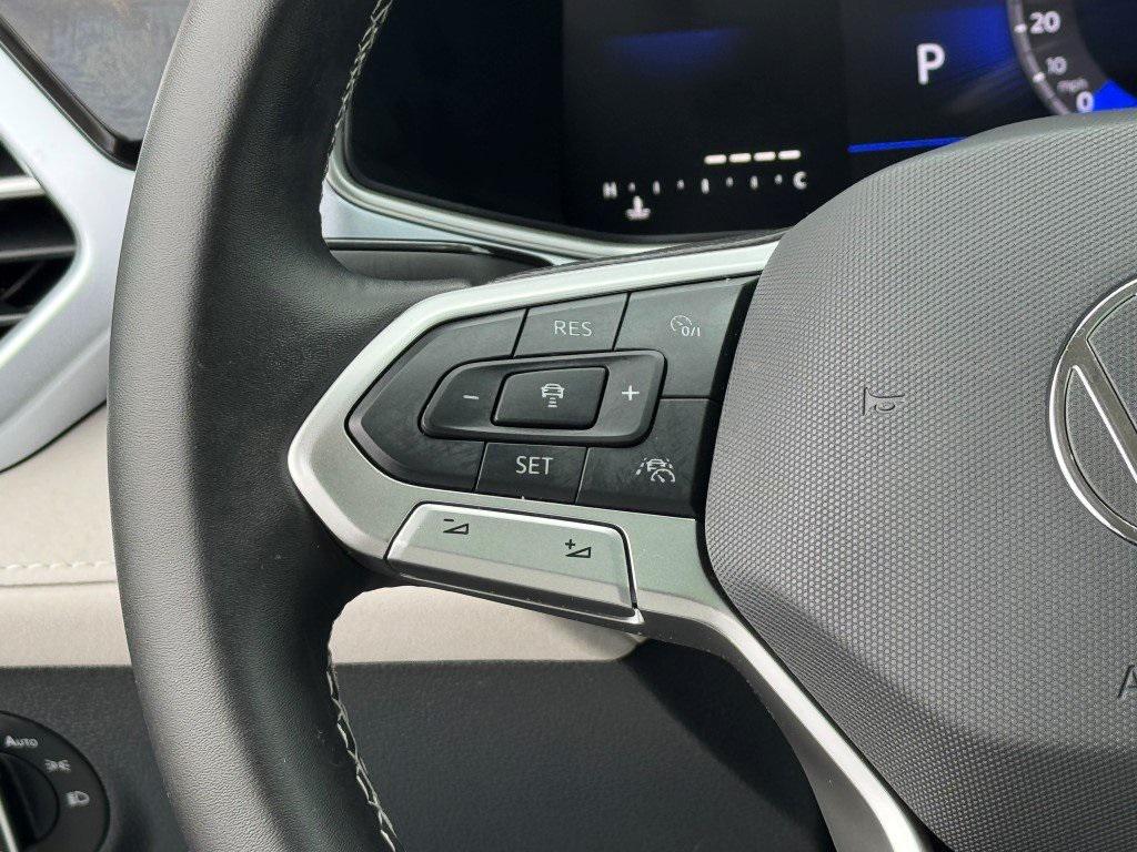 used 2025 Volkswagen Taos car, priced at $23,399