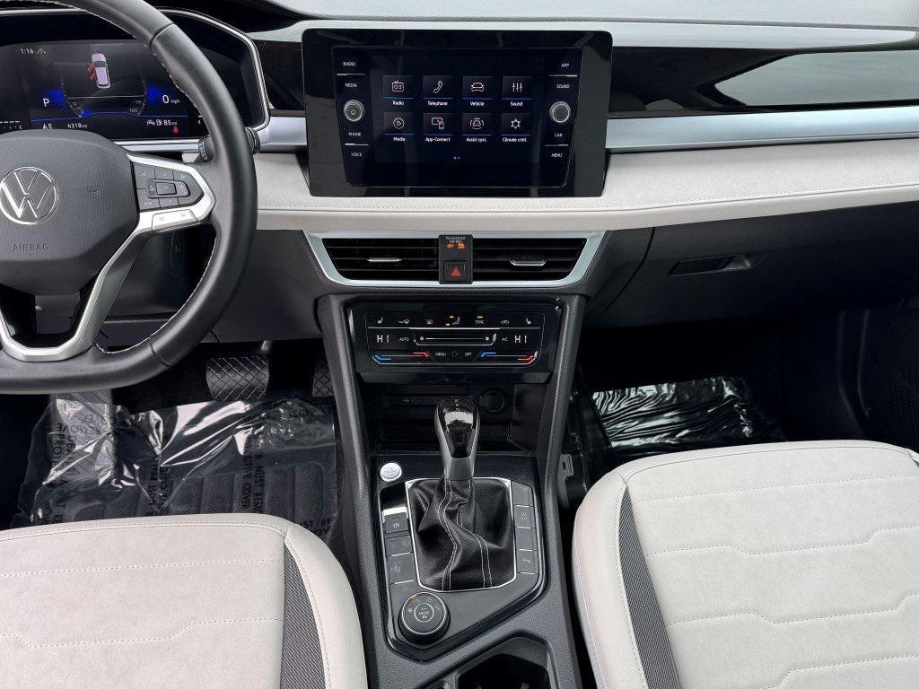 used 2025 Volkswagen Taos car, priced at $23,399
