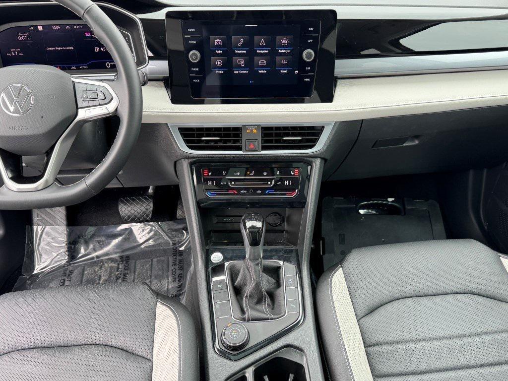 used 2025 Volkswagen Taos car, priced at $27,295