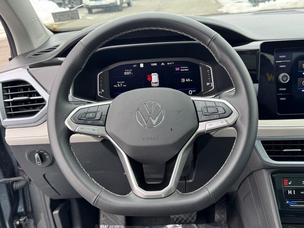used 2025 Volkswagen Taos car, priced at $27,295
