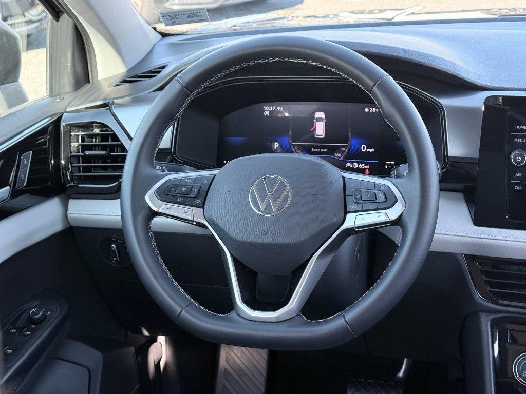 used 2025 Volkswagen Taos car, priced at $22,000