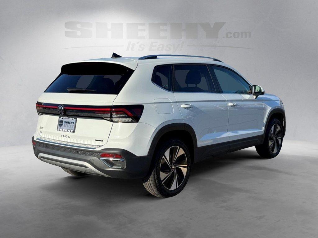 used 2025 Volkswagen Taos car, priced at $23,000