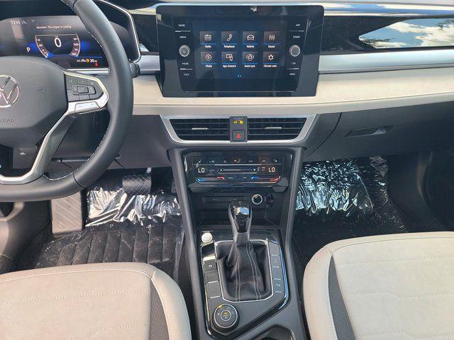 new 2025 Volkswagen Taos car, priced at $25,658