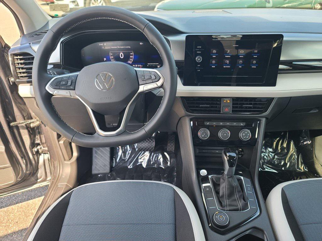new 2025 Volkswagen Taos car, priced at $23,295