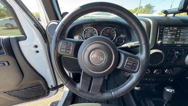 used 2013 Jeep Wrangler Unlimited car, priced at $16,995