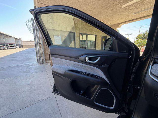used 2025 Jeep Compass car, priced at $18,995
