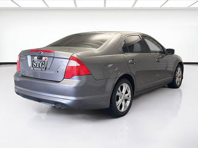 used 2012 Ford Fusion car, priced at $6,977