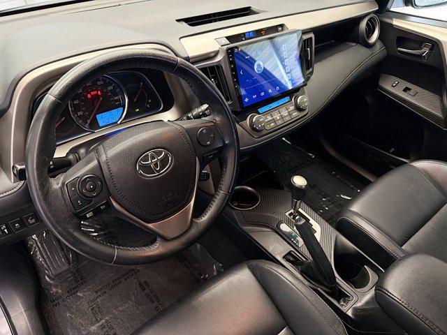 used 2015 Toyota RAV4 car, priced at $13,999