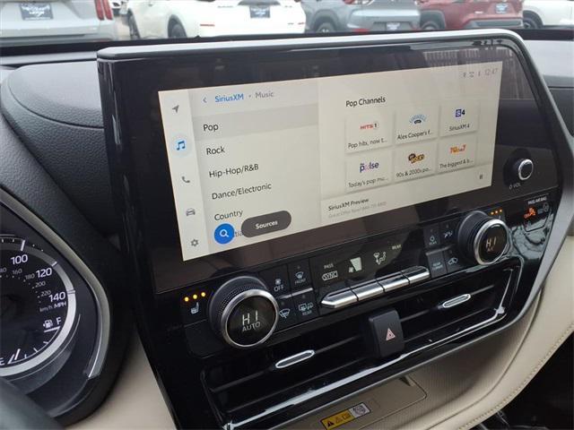 used 2023 Toyota Highlander car, priced at $32,998